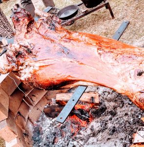 High Peak lamb on the Asado Cross at the Hut - food over fire at its best!